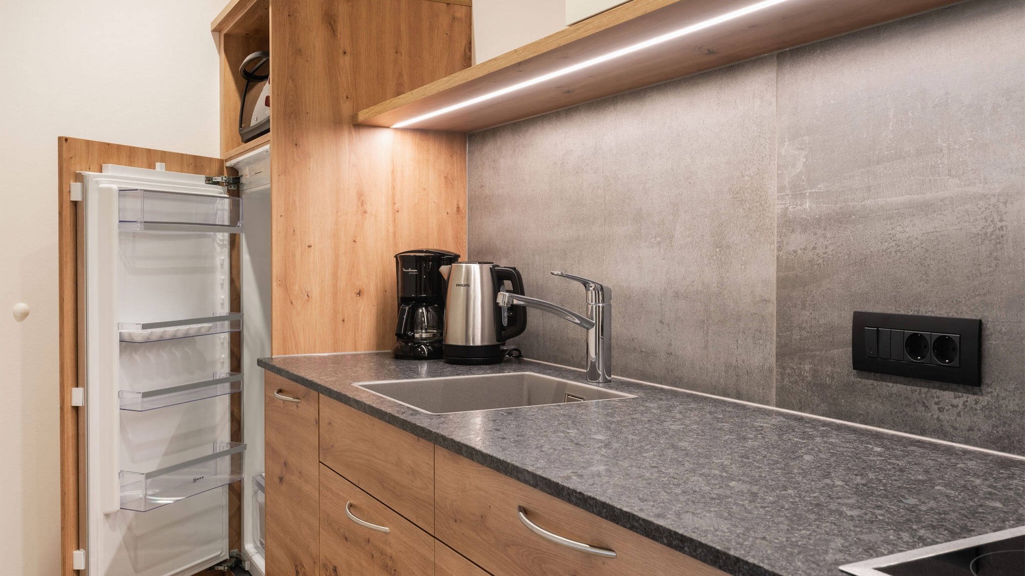 Kitchen with refrigerator