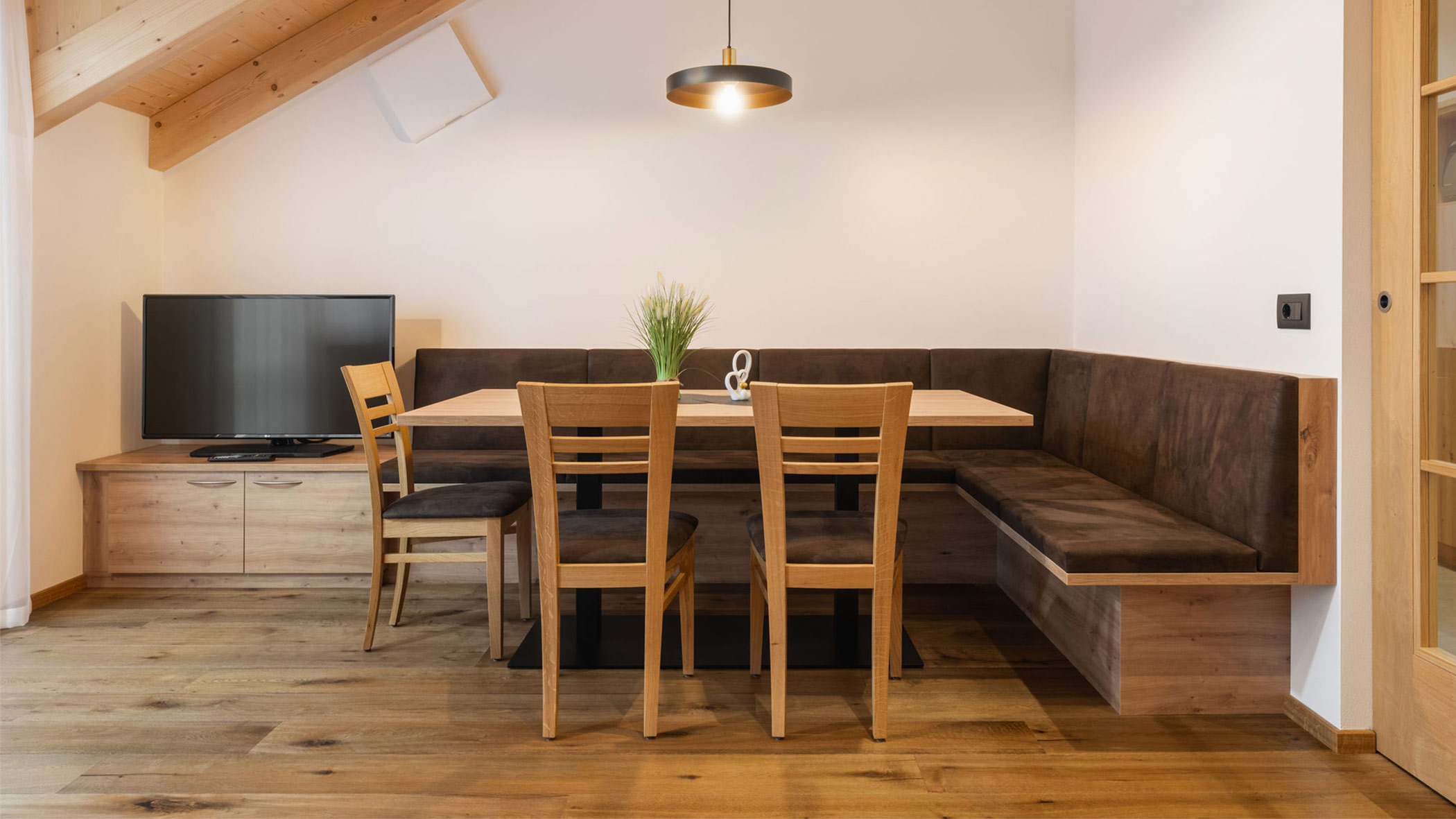 Table with chairs and television